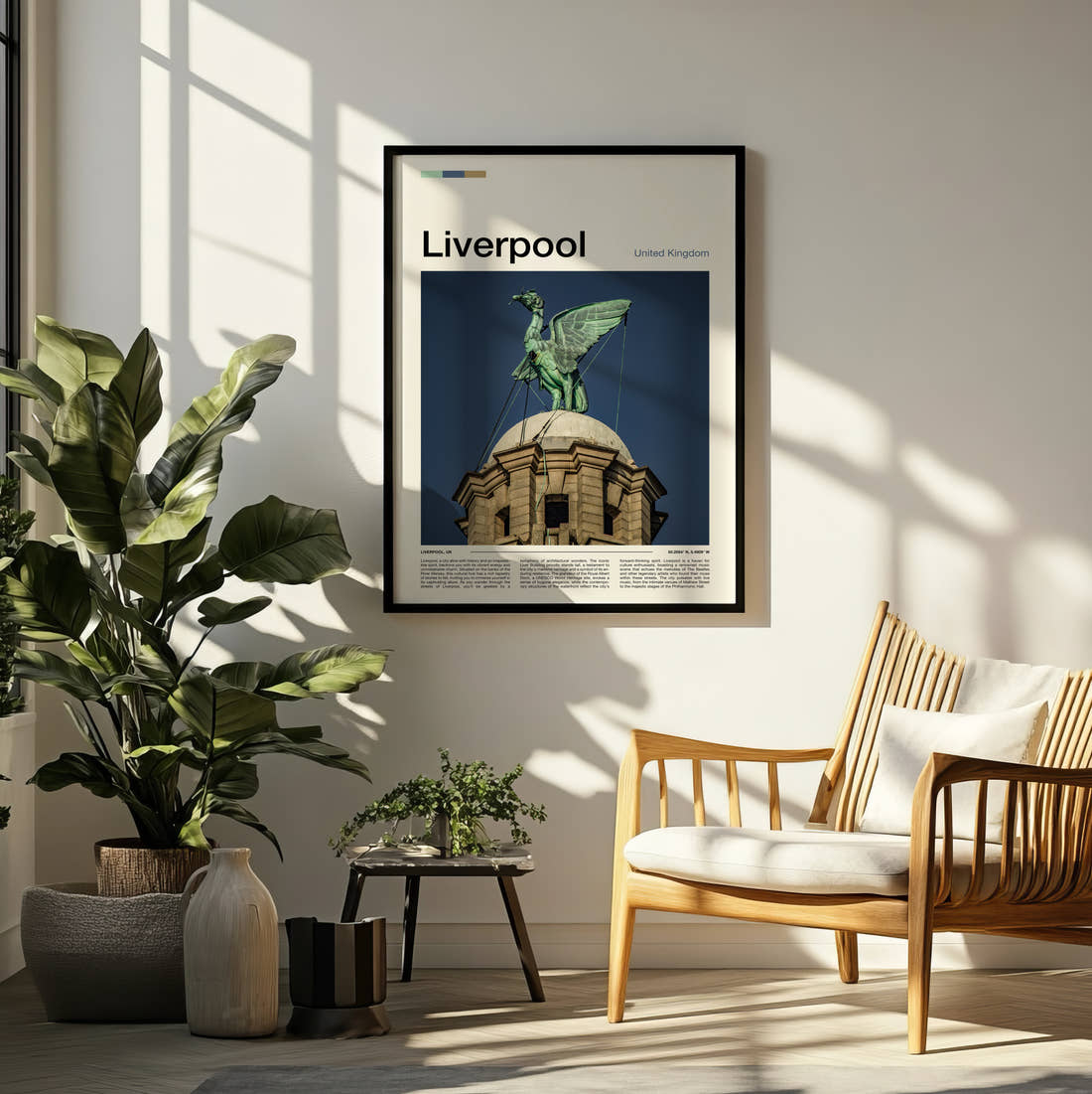 Liverpool Liver Bird Travel Print framed on a pale wall beside houseplants