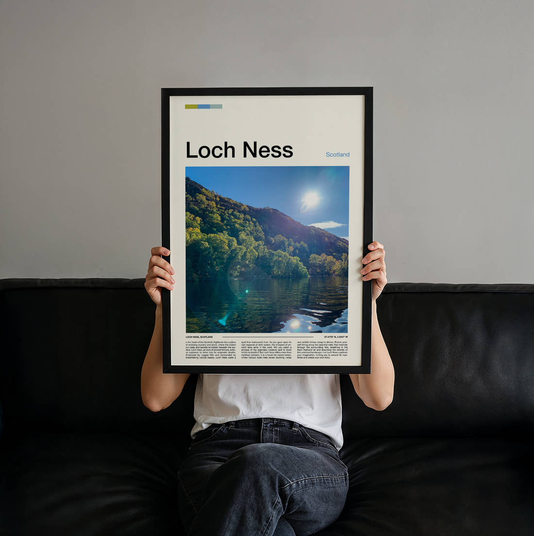 Loch Ness Sunlight Over The Loch Travel Print held up by hand to show the size of the print