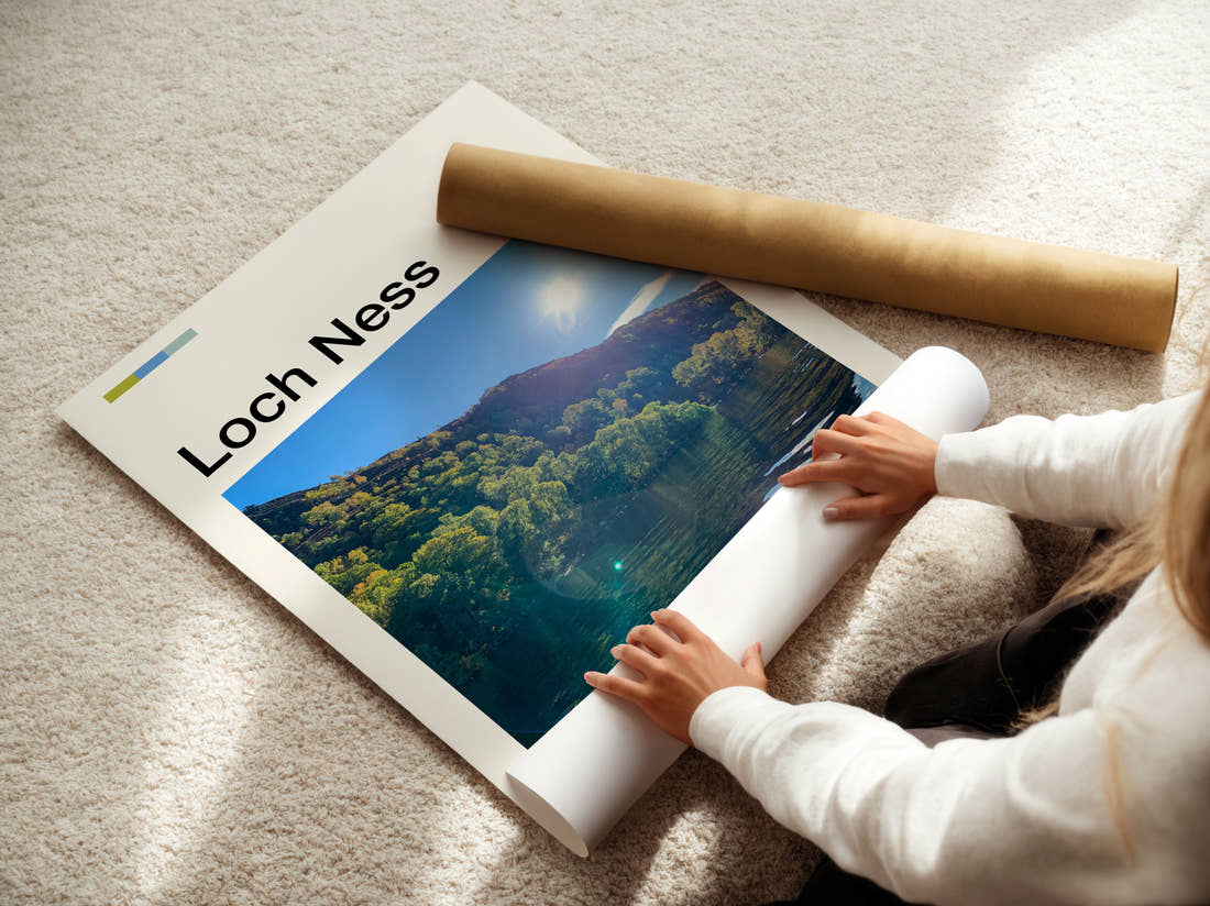 Loch Ness Sunlight Over The Loch Travel Print being unrolled from its postal tube