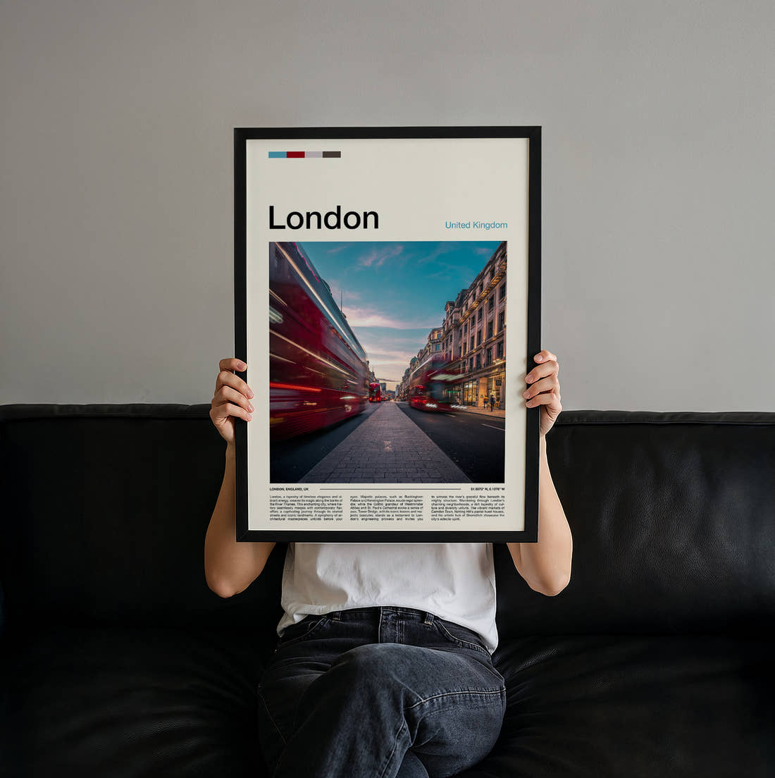 London Red Double-Decker Bus Travel Print held up by hand to show the size of the print
