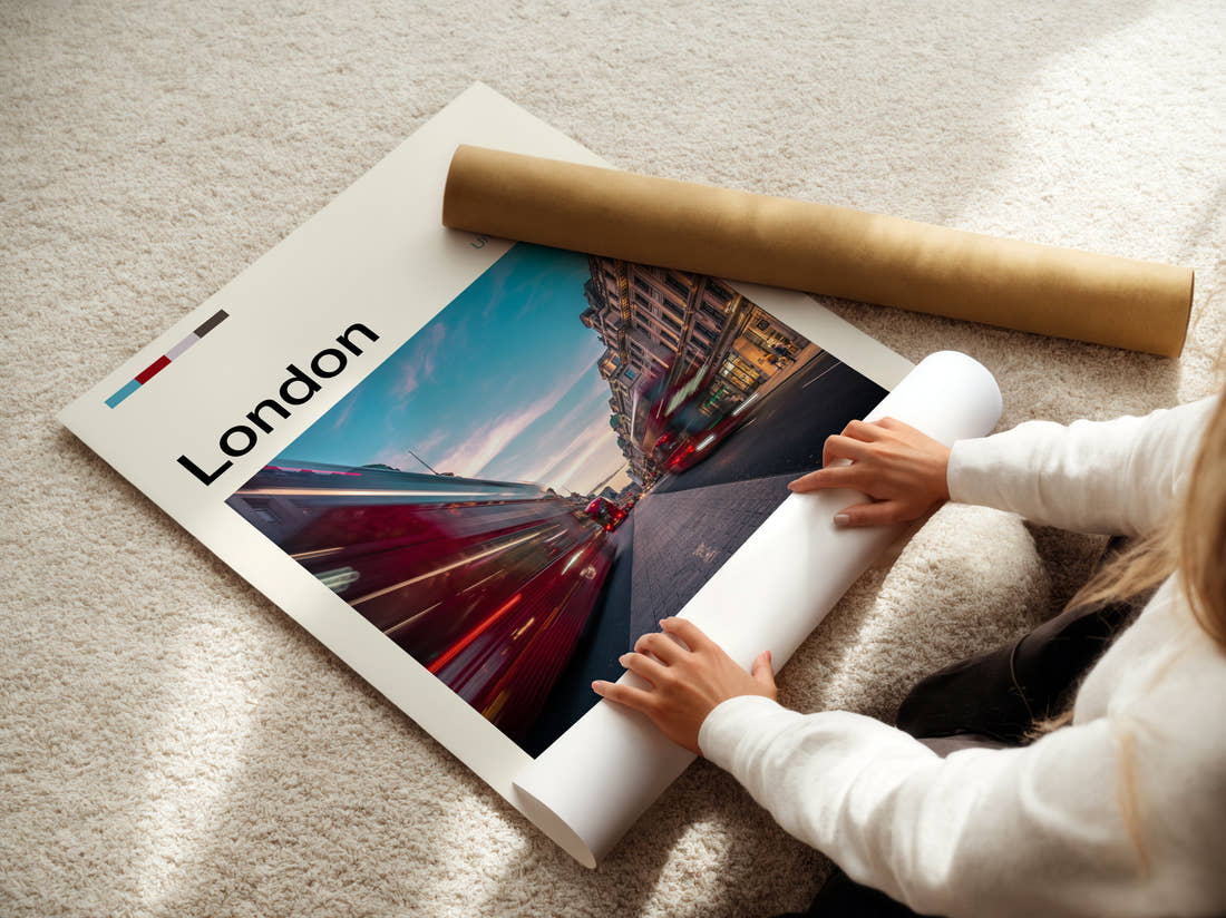 London Red Double-Decker Bus Travel Print being unrolled from its postal tube