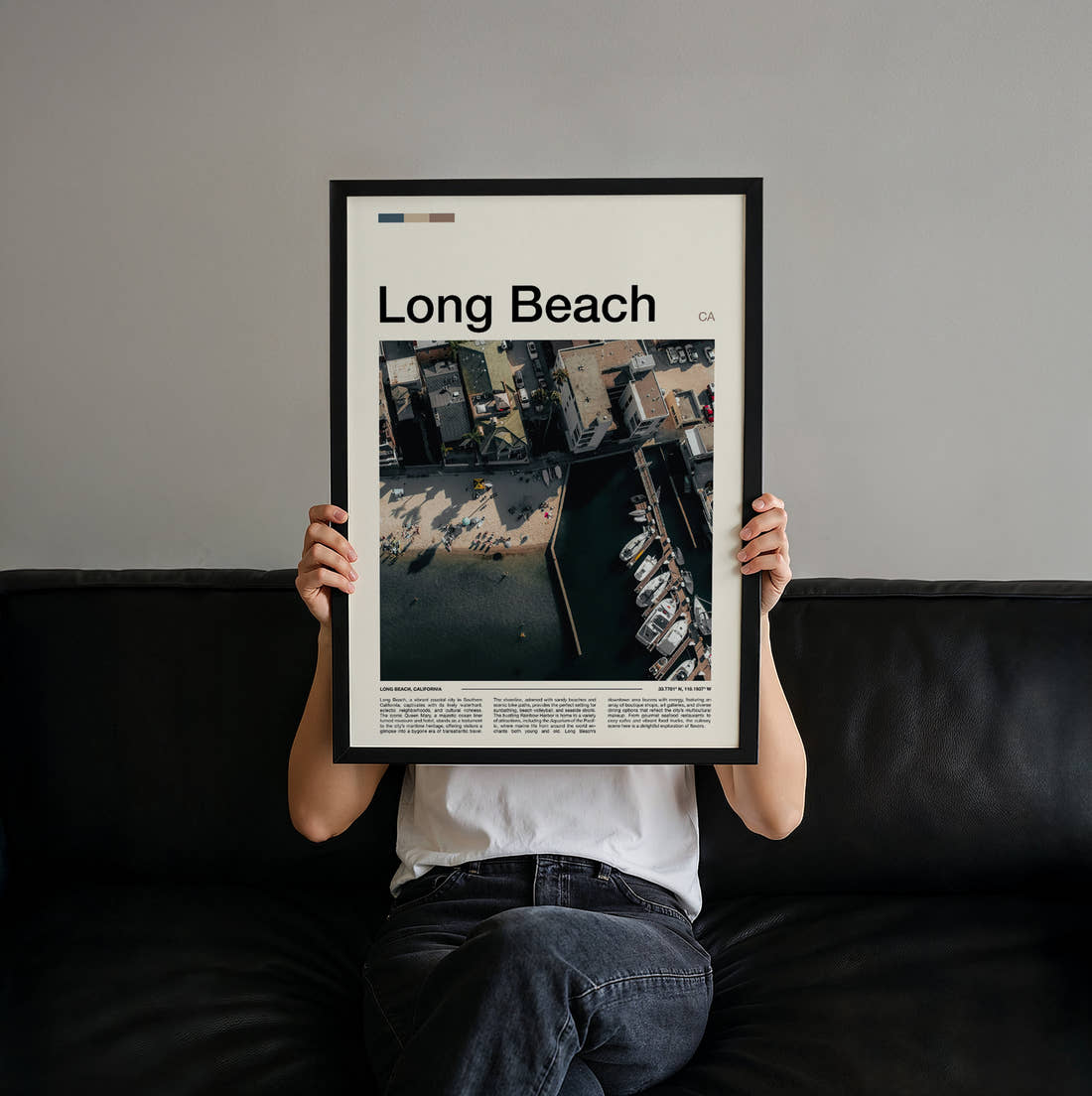 Long Beach Travel Print held up by hand to show the size of the print