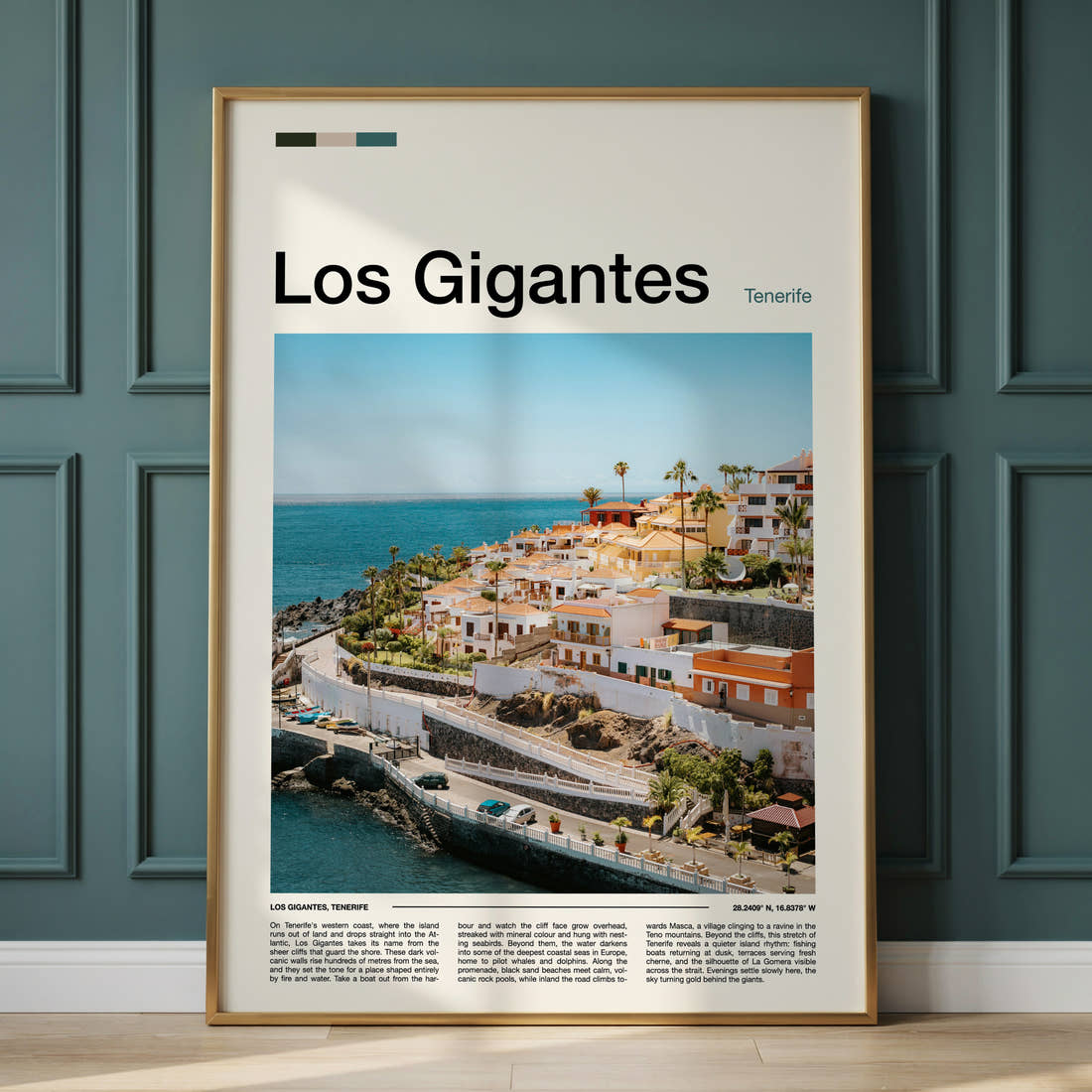 Los Gigantes Coastal Village Cliffs Travel Print framed on the wall of a calm, neutral bedroom
