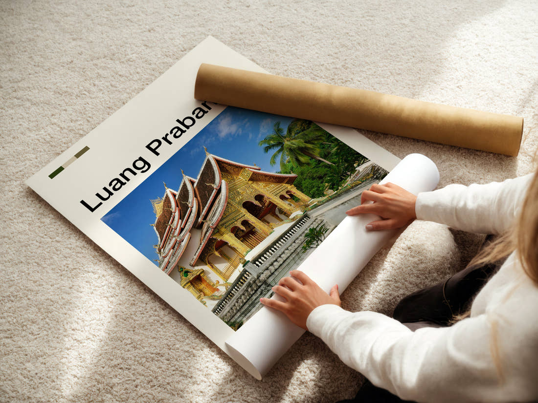 Luang Prabang Golden Temple Facade Travel Print being unrolled from its postal tube
