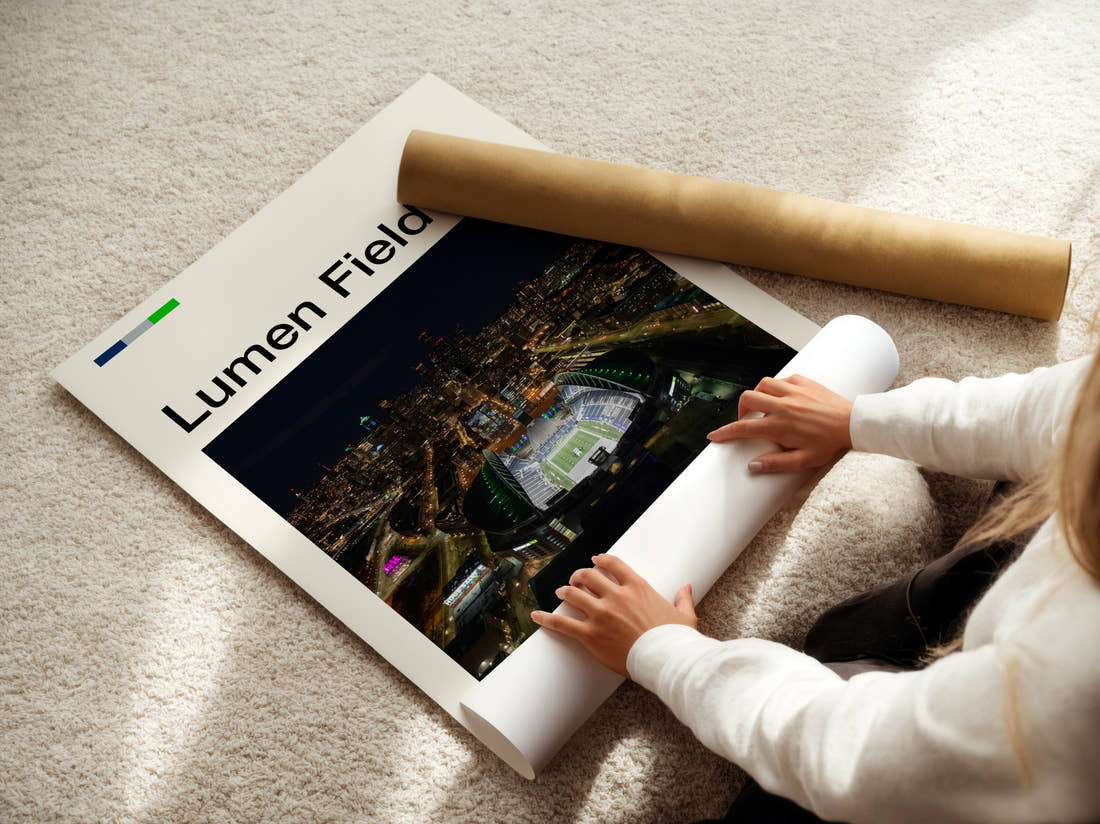 Lumen Field Stadium Print being unrolled from its postal tube