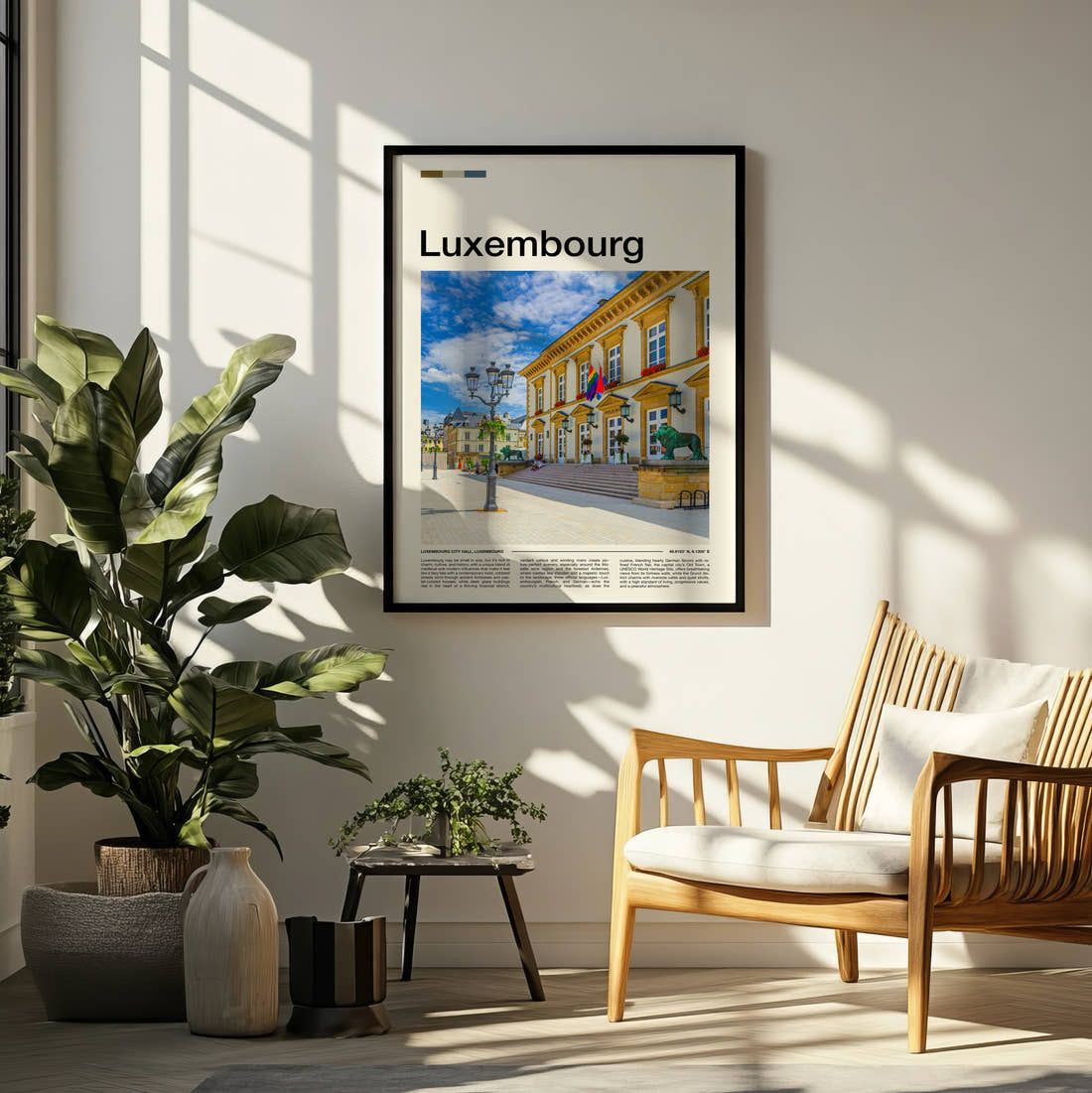Luxembourg Town Hall Travel Print framed on a pale wall beside houseplants