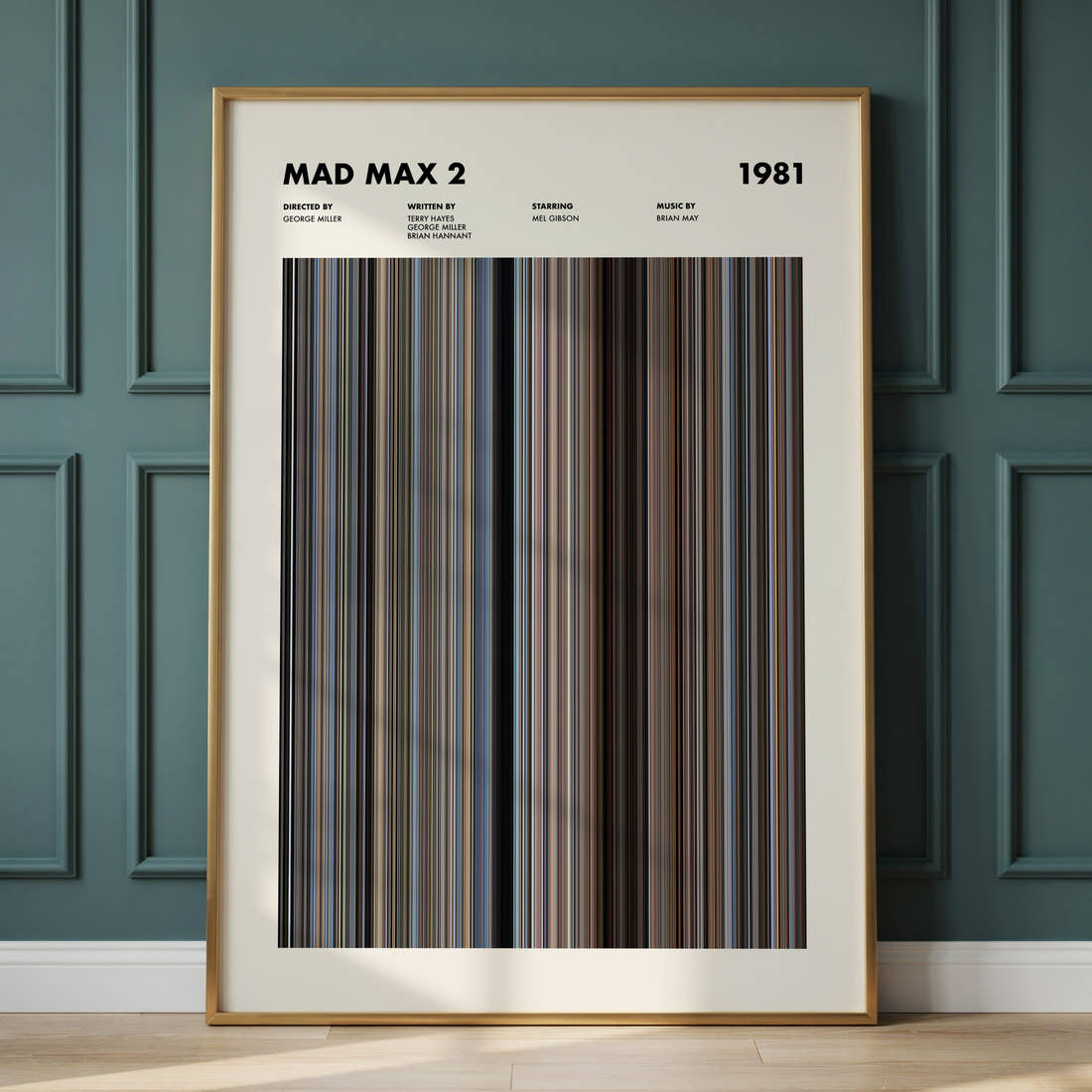 Mad Max 2 Movie Barcode Poster framed and leaning against a panelled wall