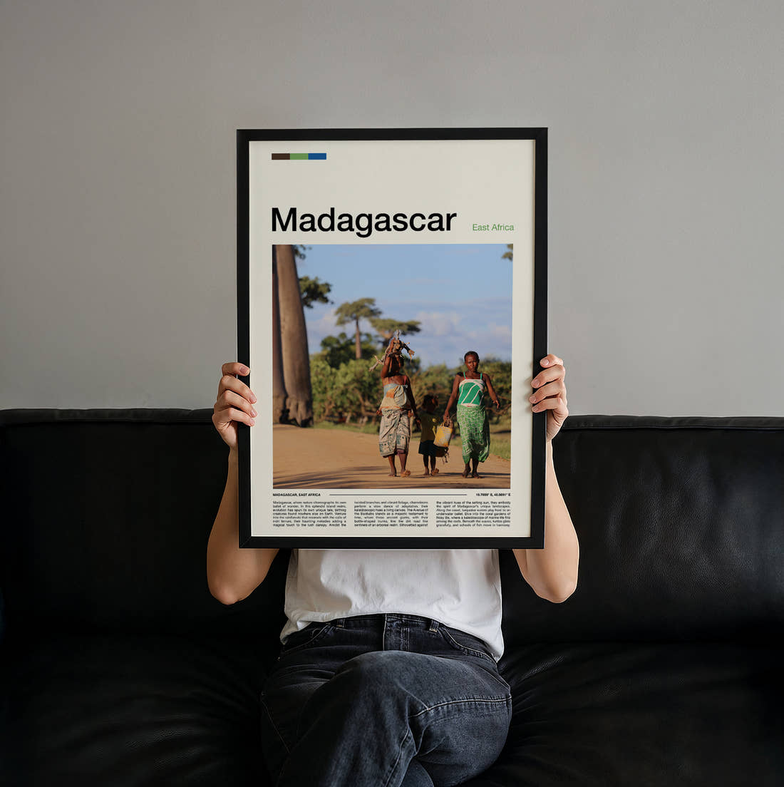 Madagascar People Walking By Baobabs Travel Print held up by hand to show the size of the print