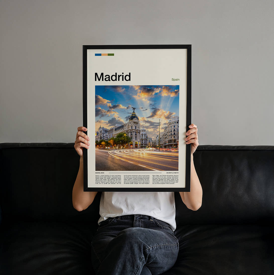 Madrid Metropolis Building Travel Print held up by hand to show the size of the print