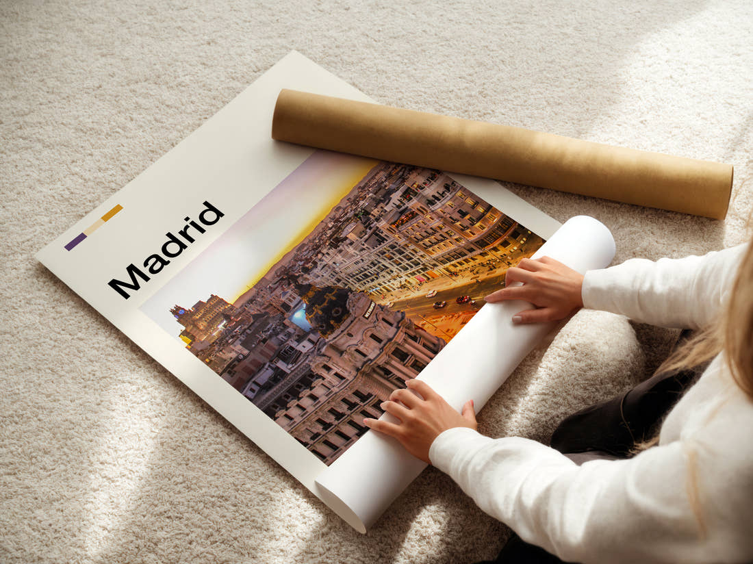 Madrid Metropolis Building At Sunset Travel Print being unrolled from its postal tube