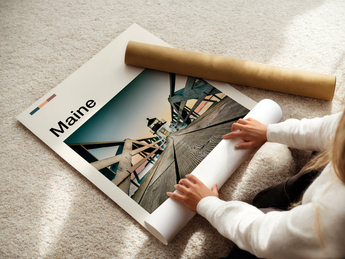 Maine Pier Leading To Lighthouse Travel Print being unrolled from its postal tube