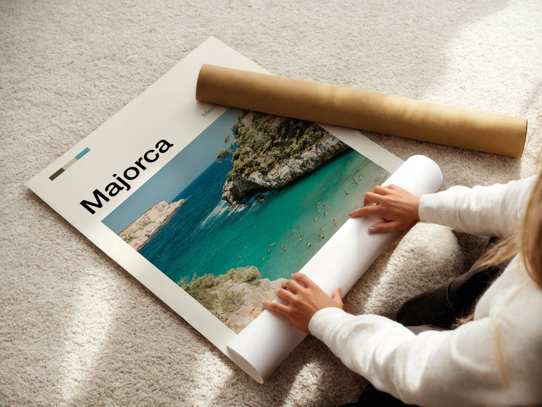 Majorca Turquoise Cove Aerial Travel Print being unrolled from its postal tube