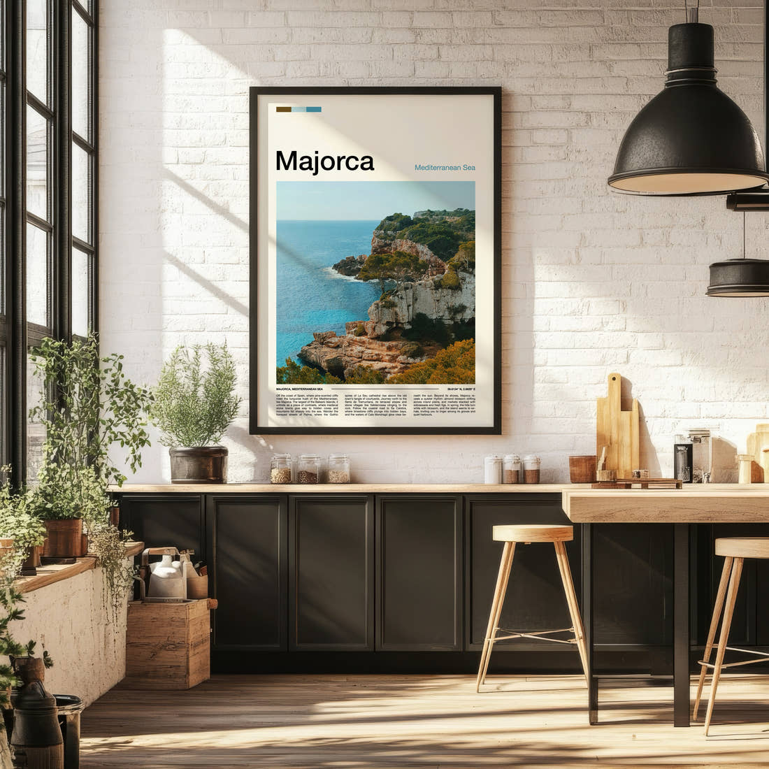 Majorca Rugged Coastal Cliffs Travel Print framed on the wall of a bright kitchen and dining space