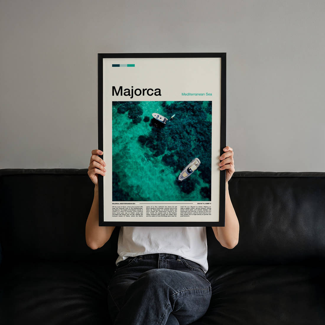 Majorca Turquoise Water From Above Travel Print held up by hand to show the size of the print