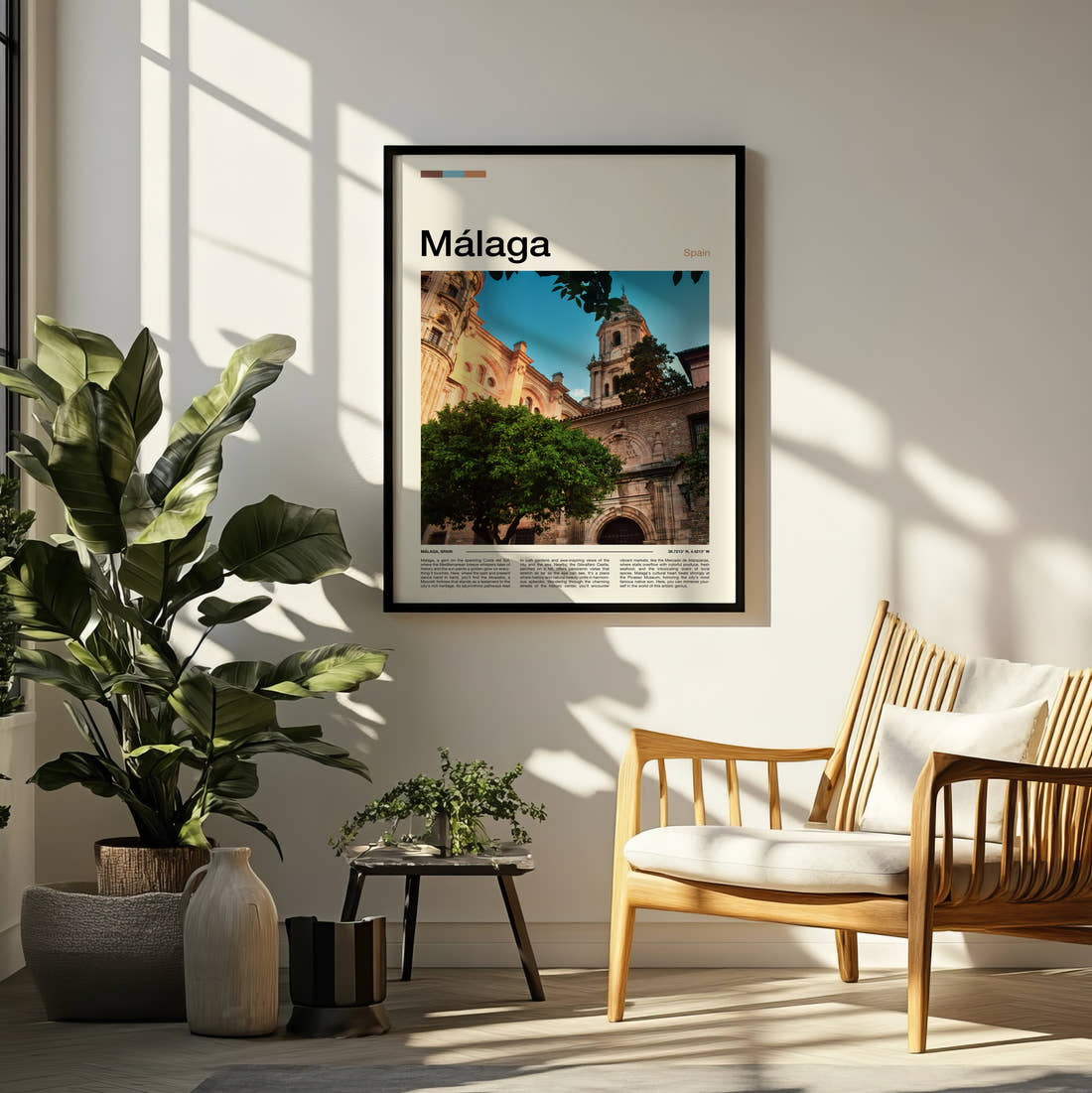 Malaga Cathedral Travel Print framed on a pale wall beside houseplants