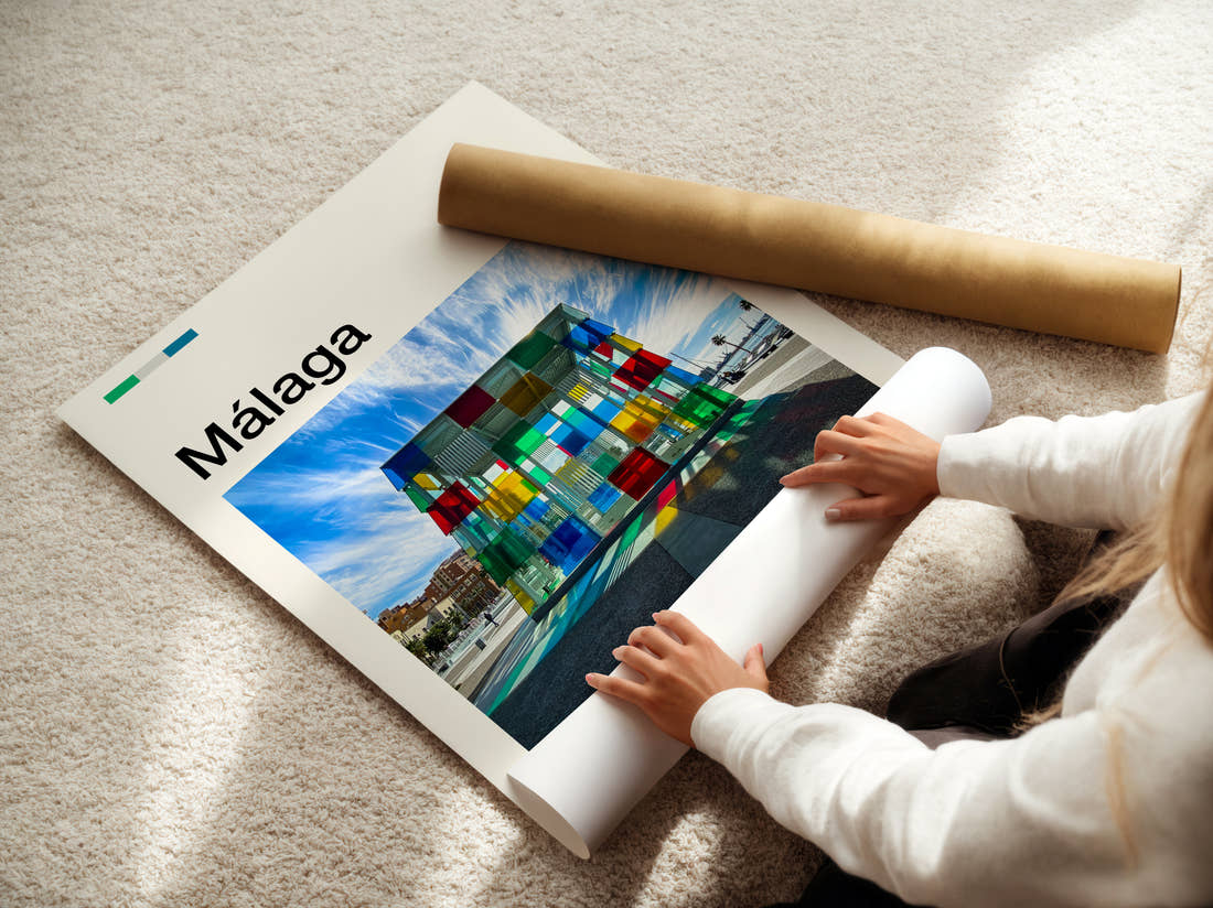 Malaga Coloured Glass Cube Travel Print being unrolled from its postal tube