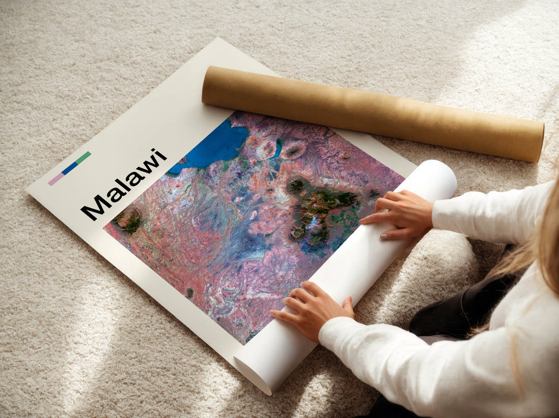 Malawi Colourful Rock Patterns Travel Print being unrolled from its postal tube