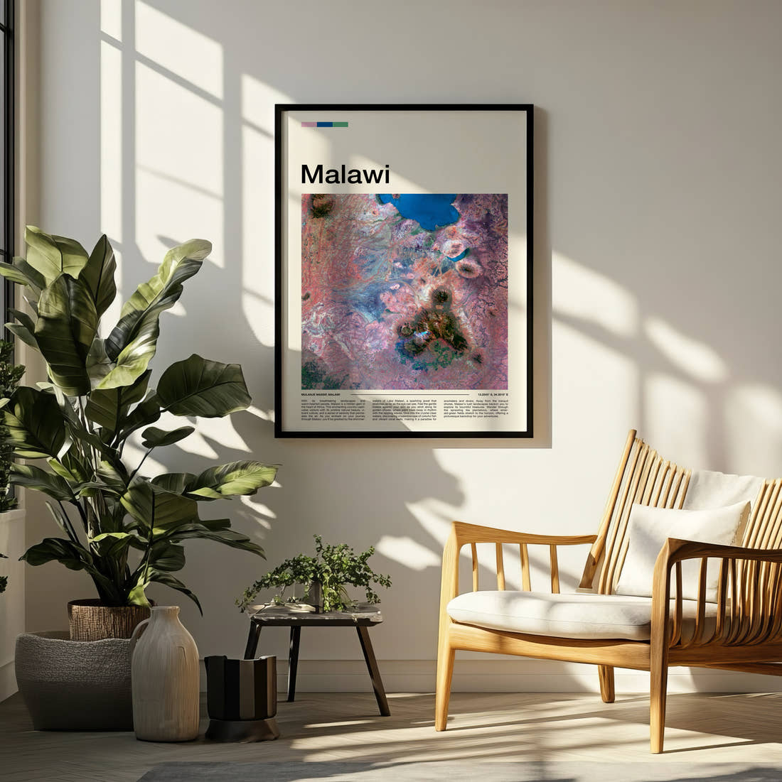 Malawi Colourful Rock Patterns Travel Print framed on a pale wall beside houseplants