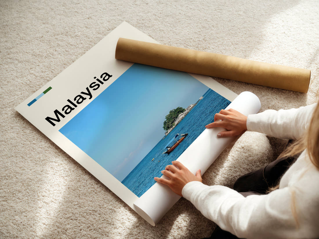 Malaysia Small Island And Boat Travel Print being unrolled from its postal tube