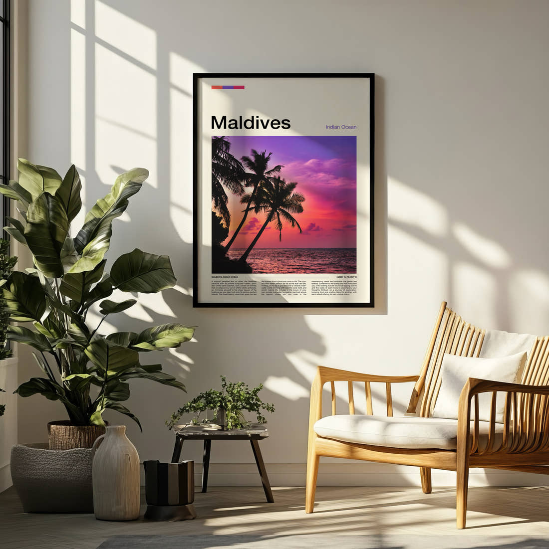 Maldives Pink Sunset Behind Palms Travel Print framed on a pale wall beside houseplants