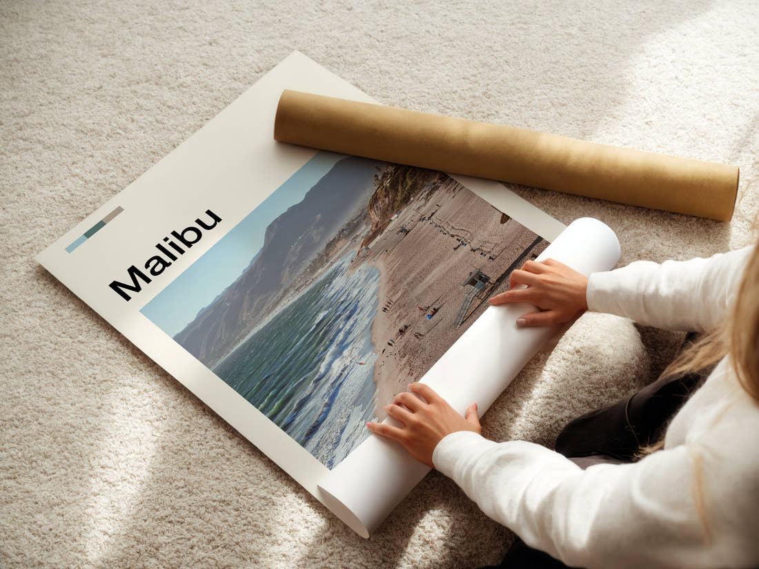 Malibu Beach And Coastal Hills Travel Print being unrolled from its postal tube