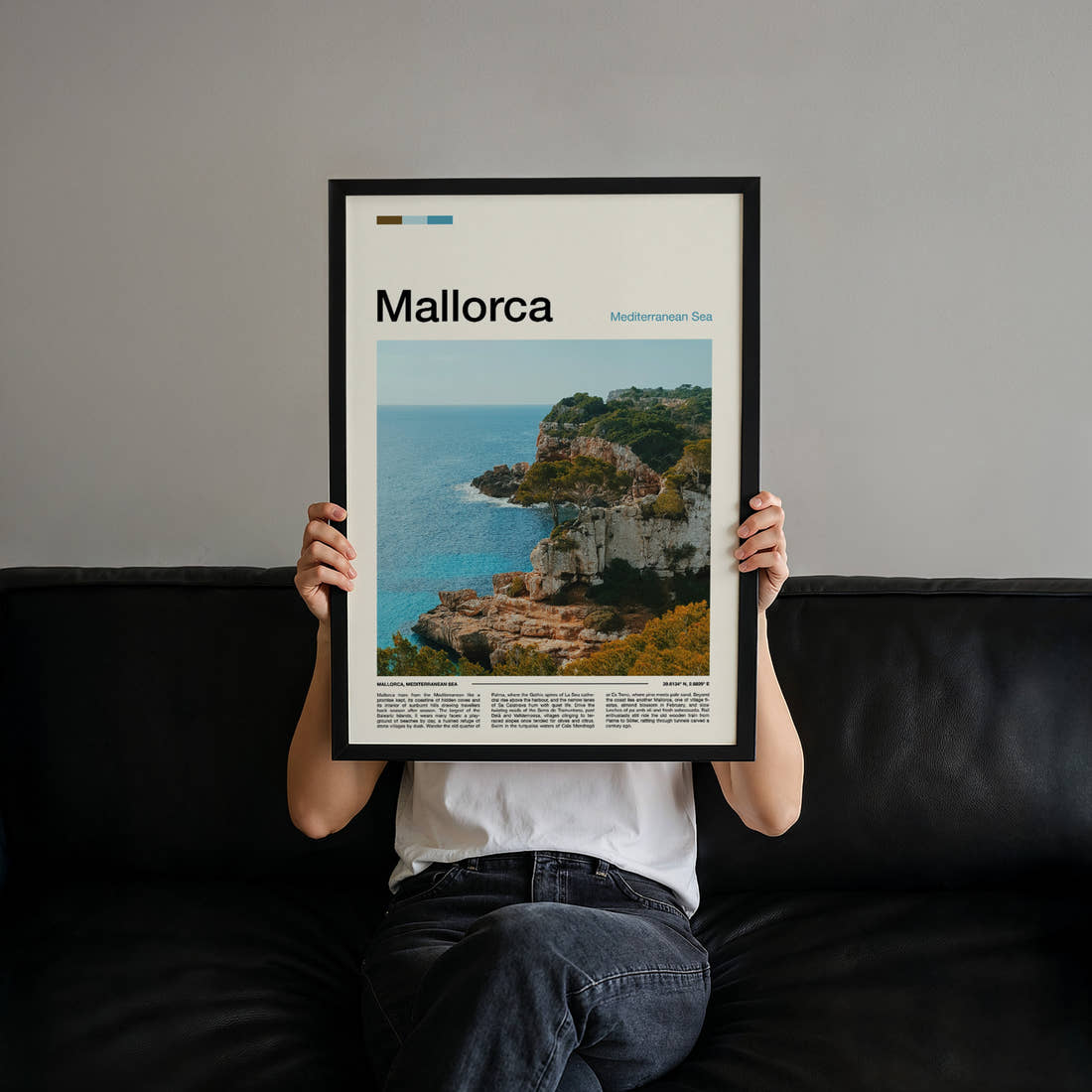 Mallorca Limestone Sea Cliffs Travel Print held up by hand to show the size of the print