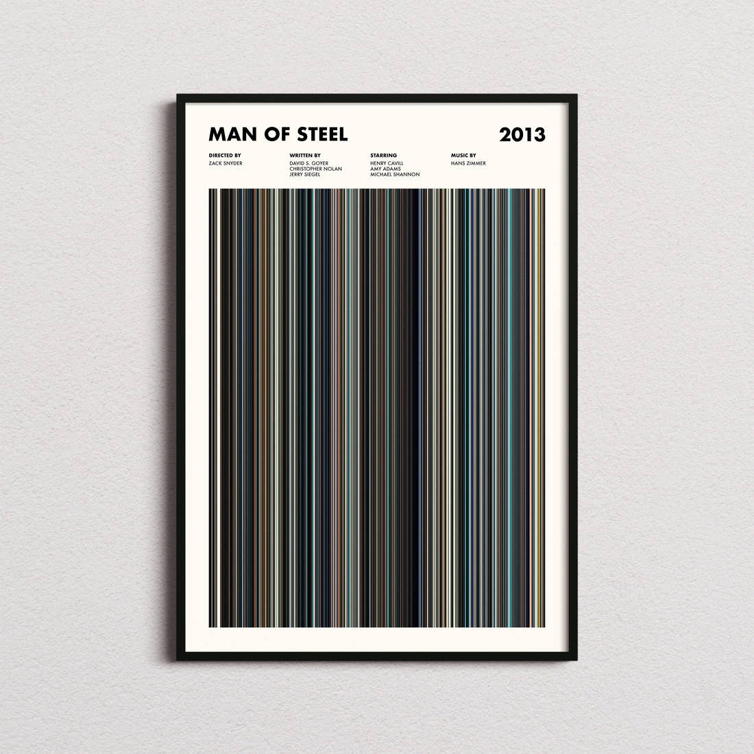 Man of Steel Movie Barcode Poster framed on a plain studio wall