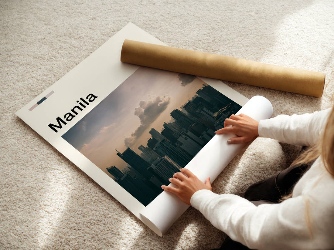 Manila Skyline Under Dark Clouds Travel Print being unrolled from its postal tube