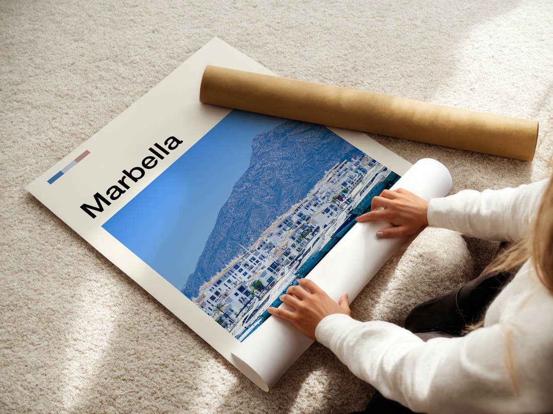 Marbella Marina Below The Mountain Travel Print being unrolled from its postal tube