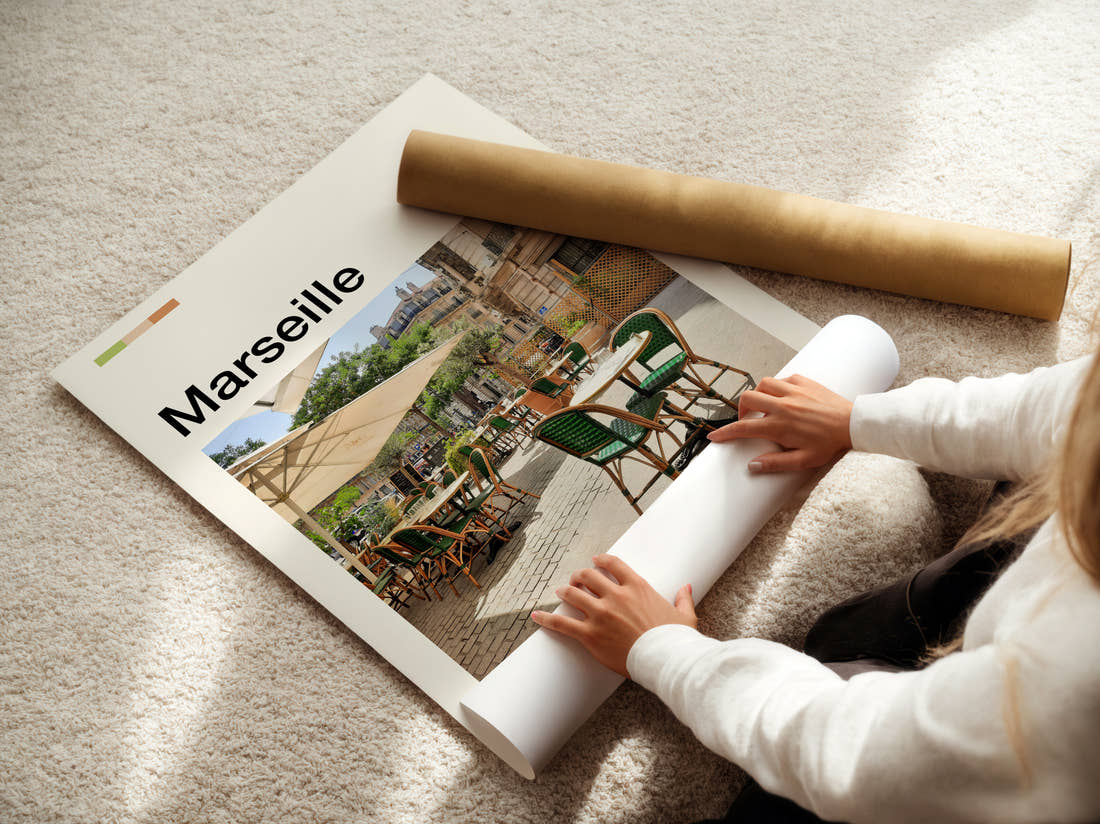 Marseille Cafe Terrace Travel Print being unrolled from its postal tube