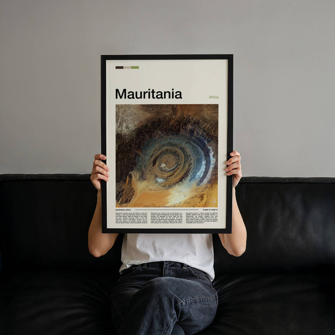 Mauritania Richat Structure Aerial Travel Print held up by hand to show the size of the print