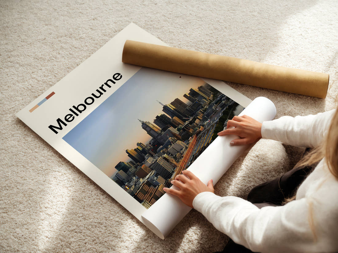 Melbourne Skyline At Golden Hour Travel Print being unrolled from its postal tube