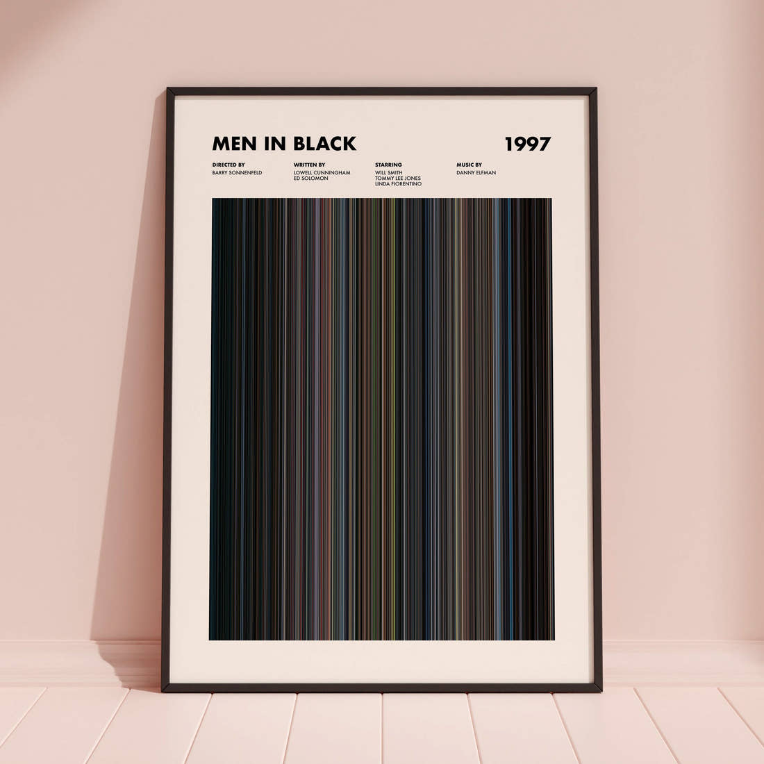 Men In Black Movie Barcode Poster framed and leaning against a coloured wall