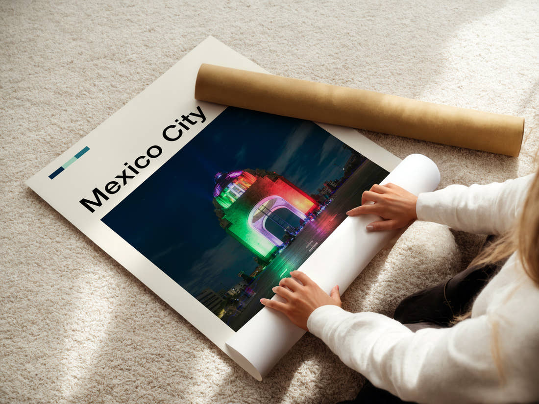 Mexico City Illuminated Monument Arch Travel Print being unrolled from its postal tube