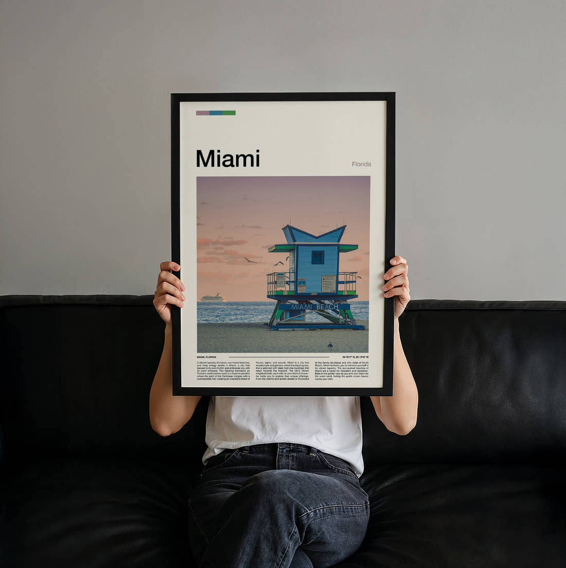 Miami Lifeguard Tower Travel Print held up by hand to show the size of the print