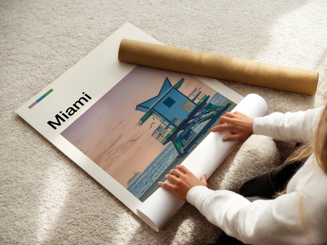 Miami Lifeguard Tower Travel Print being unrolled from its postal tube