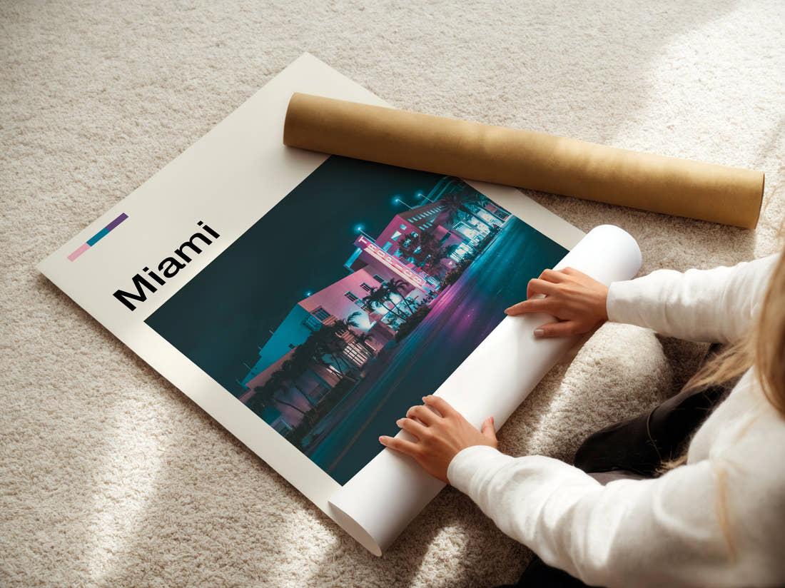 Miami Neon Art Deco Building Travel Print being unrolled from its postal tube