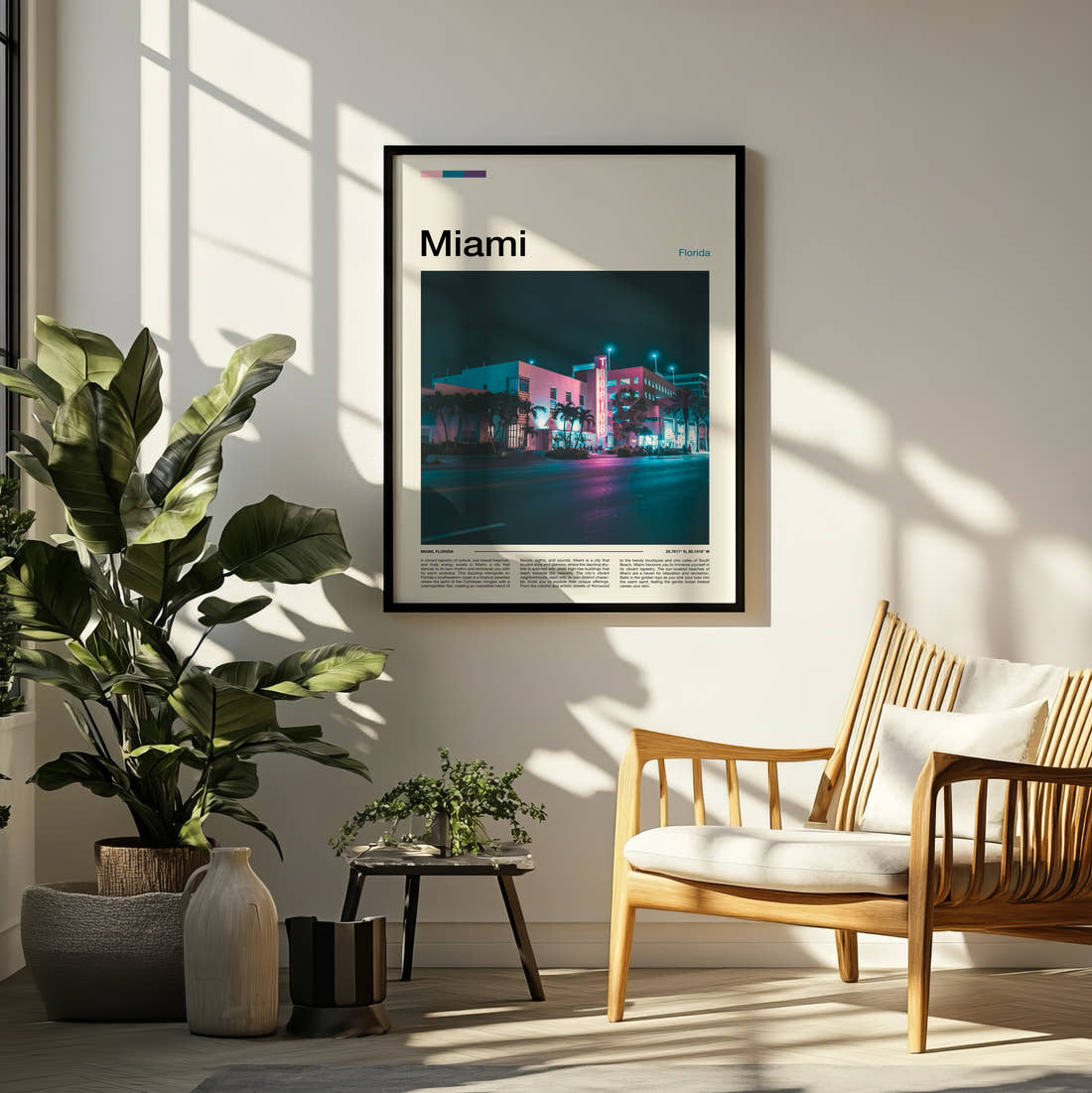 Miami Neon Art Deco Building Travel Print framed on a pale wall beside houseplants