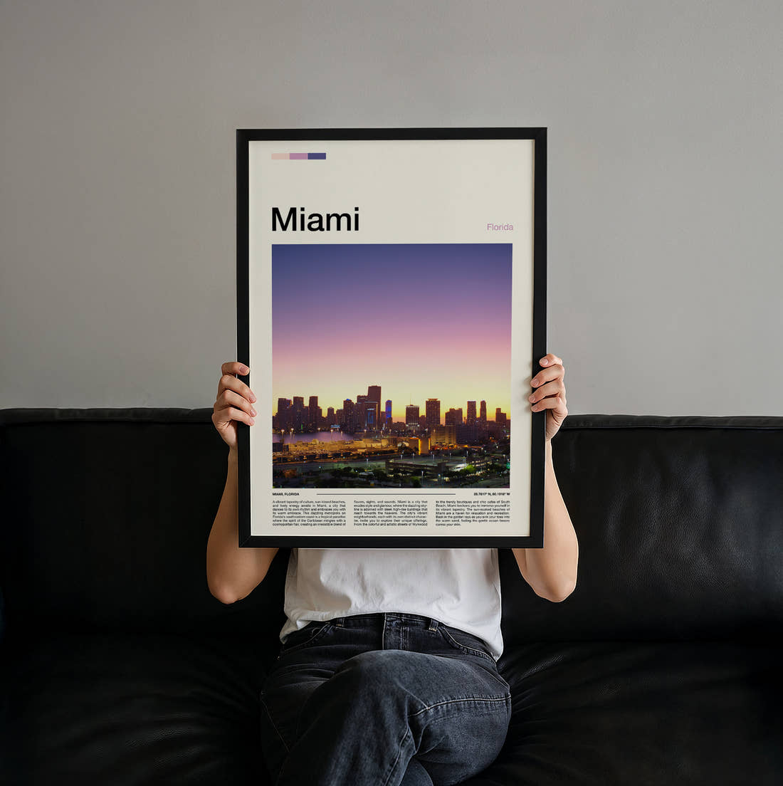 Miami Skyline At Sunset Travel Print held up by hand to show the size of the print