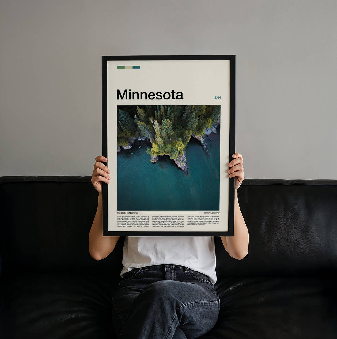 Minnesota Aerial Forested Shoreline Travel Print held up by hand to show the size of the print