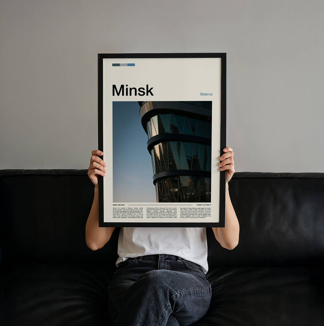 Minsk Curved Glass Building Travel Print held up by hand to show the size of the print