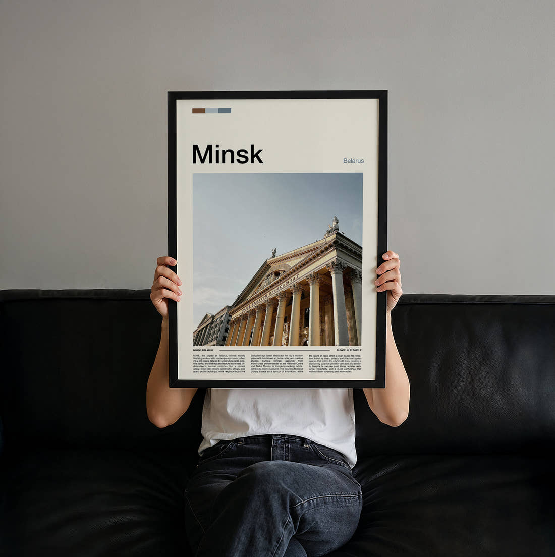 Minsk Columned Facade Travel Print held up by hand to show the size of the print
