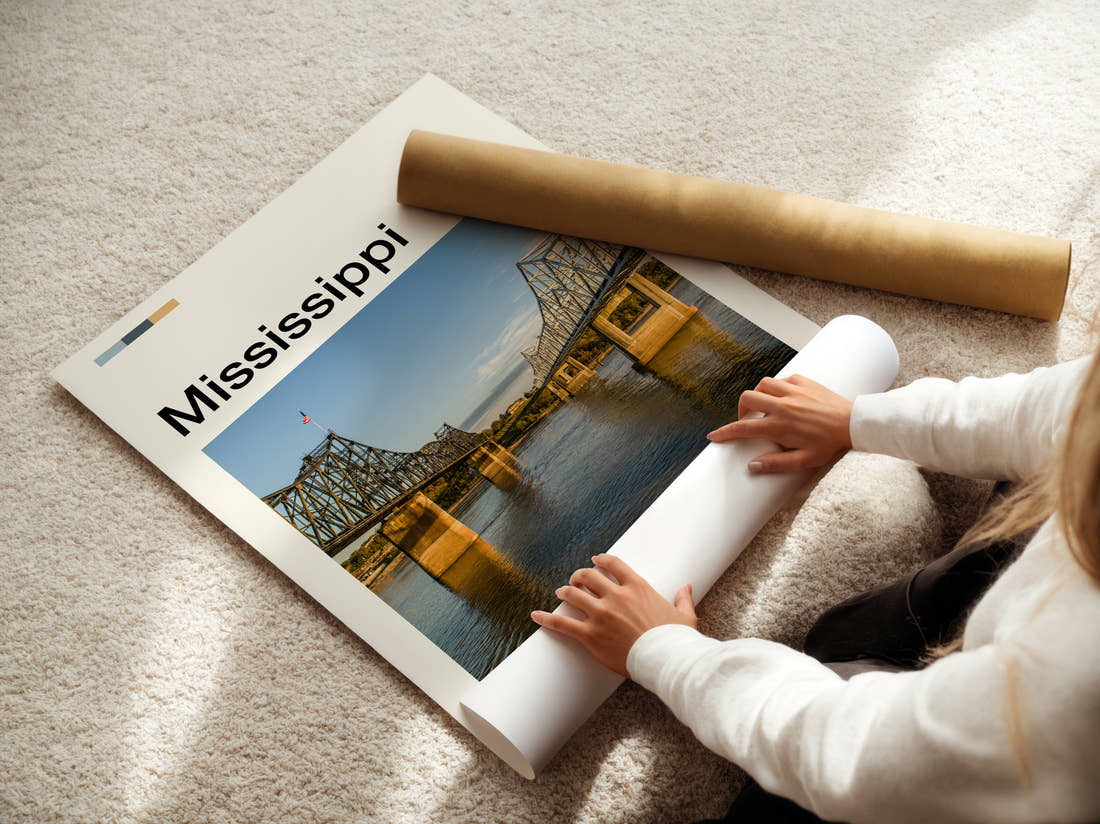 Mississippi Two Bridges Travel Print being unrolled from its postal tube