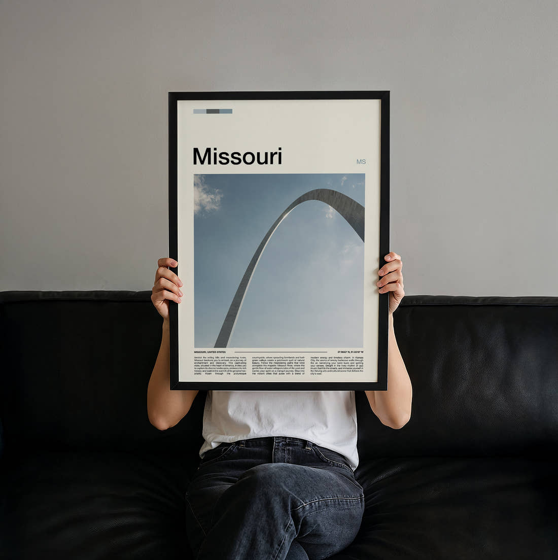 Missouri Gateway Arch Travel Print held up by hand to show the size of the print