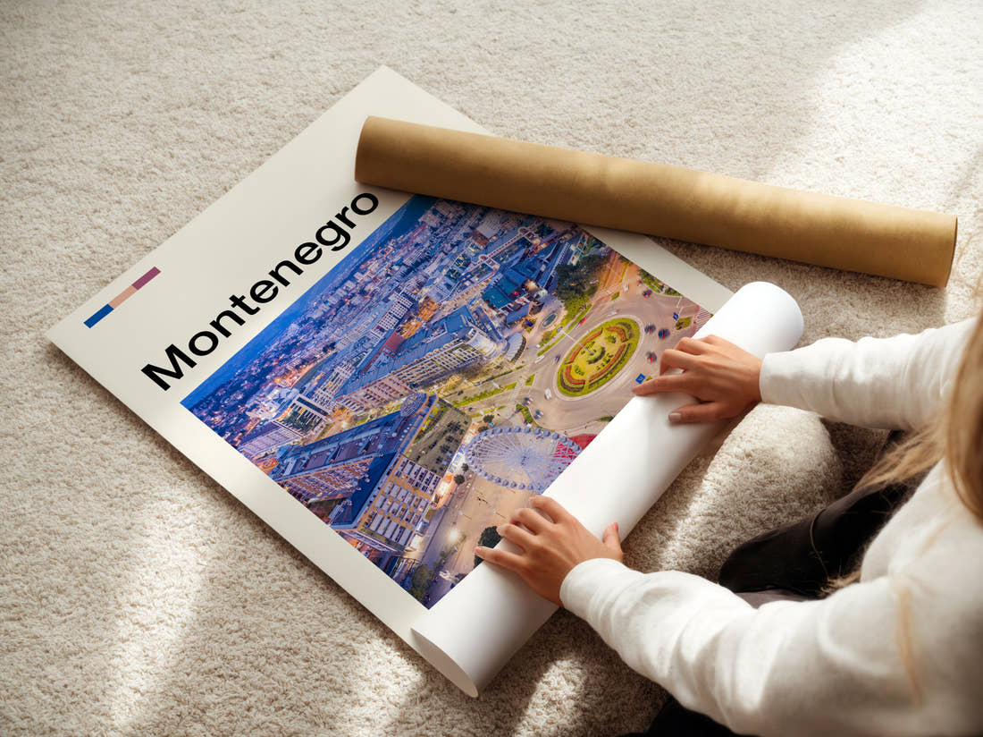 Montenegro Aerial City At Night Travel Print being unrolled from its postal tube