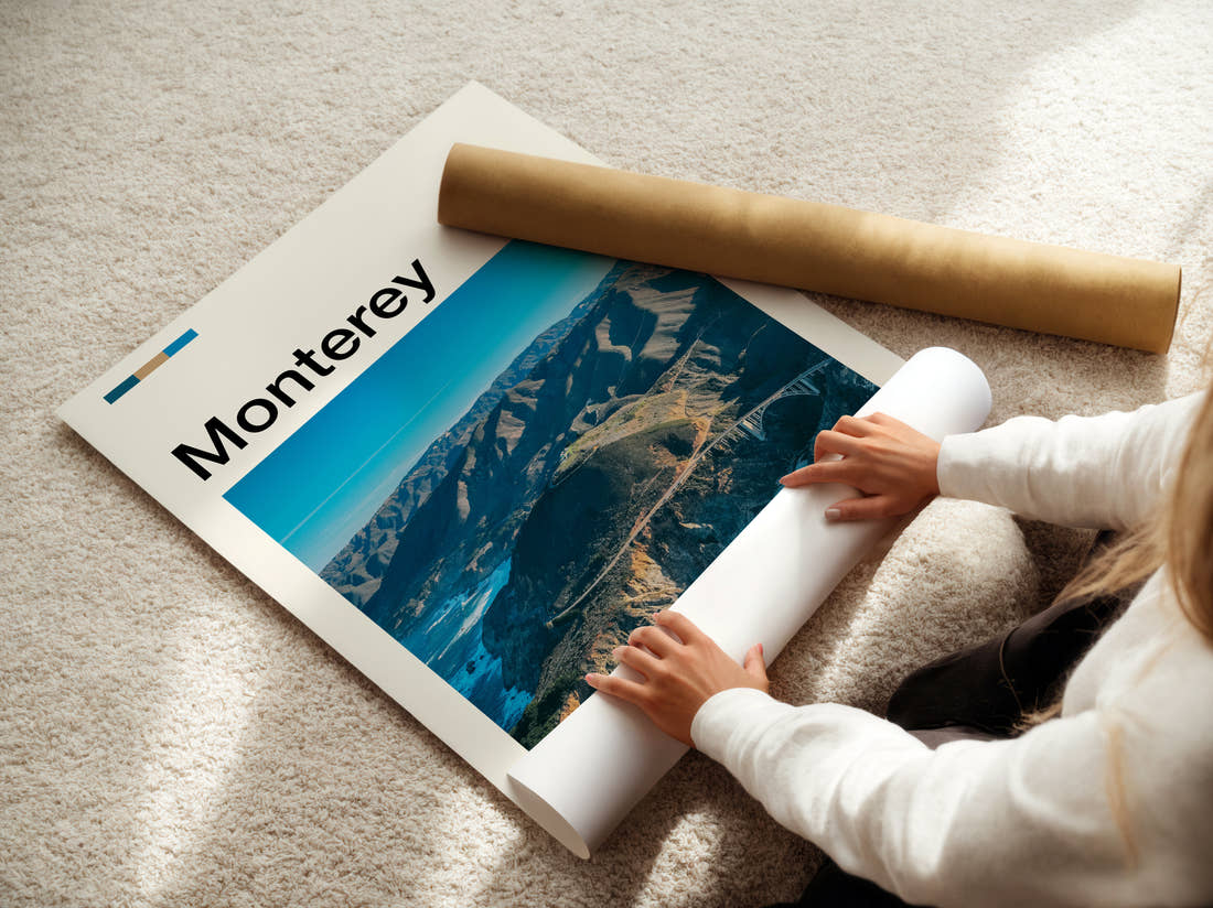 Monterey Aerial Coastal Cliffs Travel Print being unrolled from its postal tube