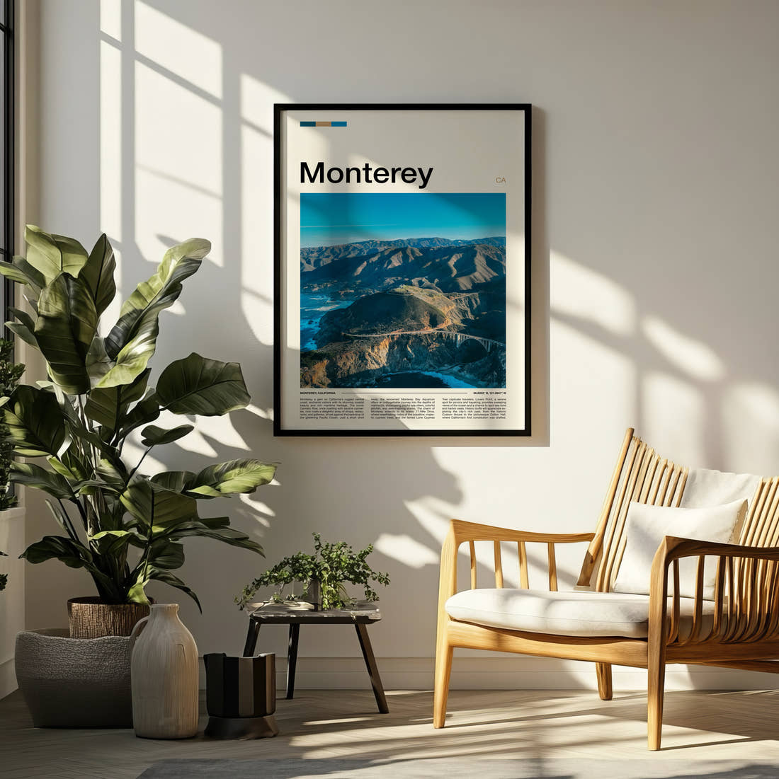 Monterey Aerial Coastal Cliffs Travel Print framed on a pale wall beside houseplants