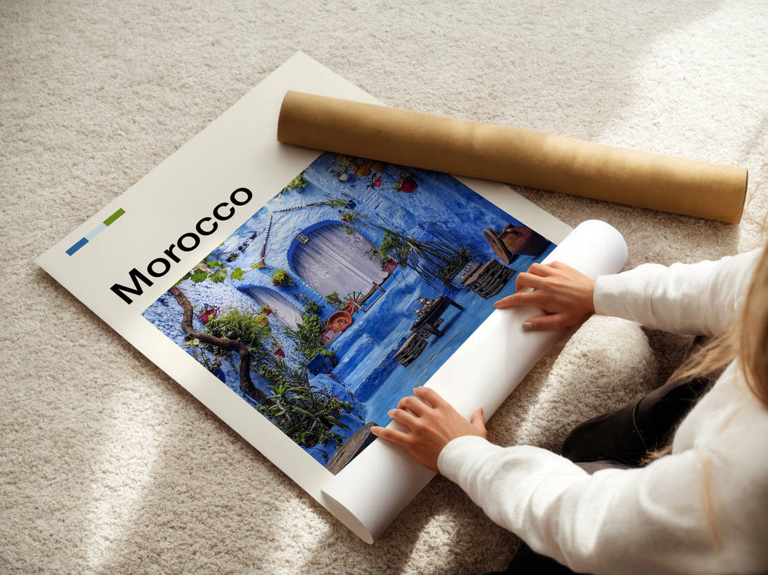 Morocco Blue Painted Courtyard Travel Print being unrolled from its postal tube