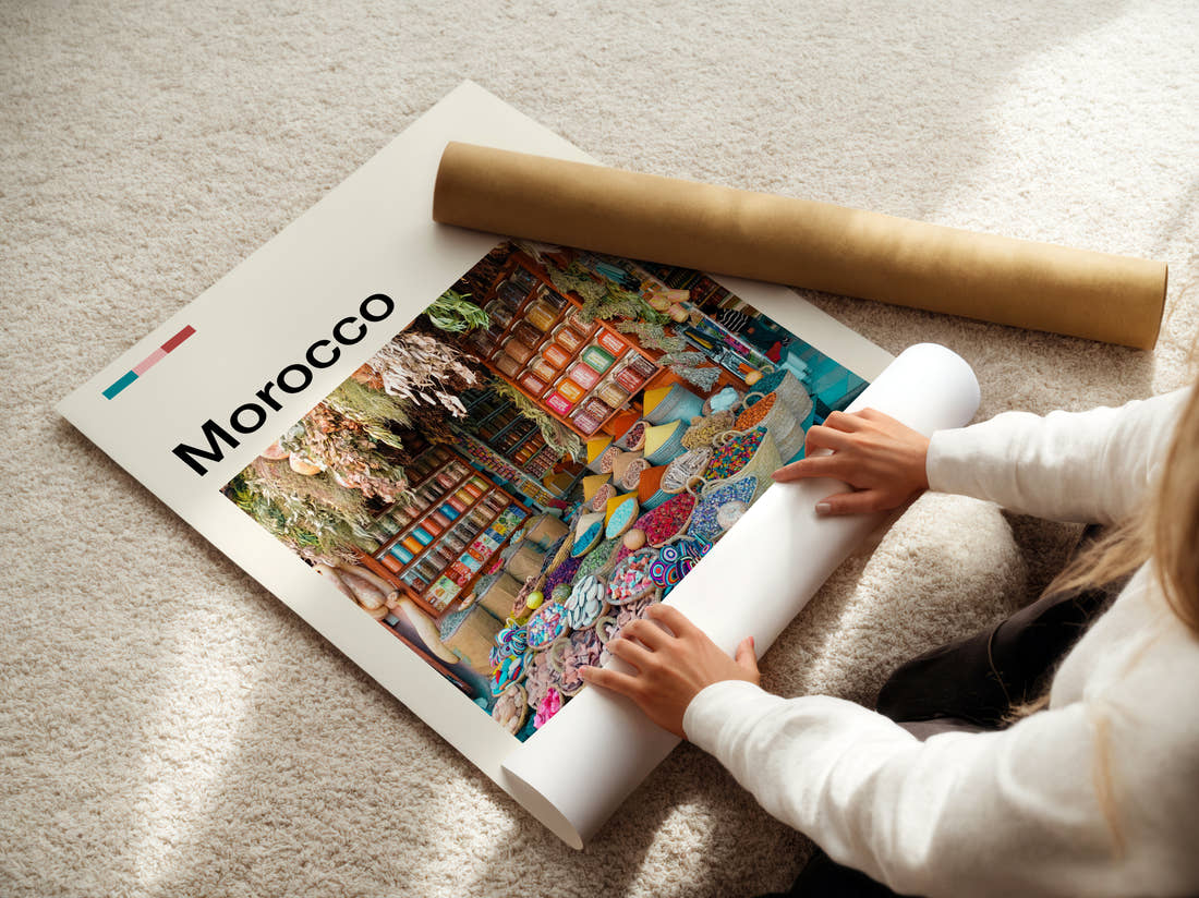 Morocco Spice Market Stall Travel Print being unrolled from its postal tube