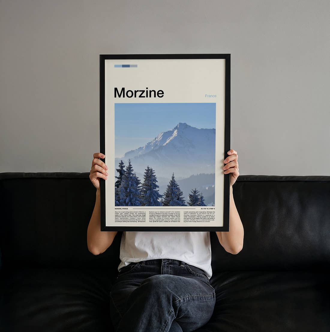 Morzine Snowy Pines And Peak Travel Print held up by hand to show the size of the print